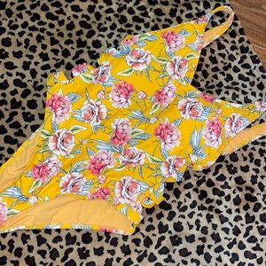 Never worn flattering one-piece swimsuit.